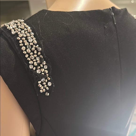 Black Sleeveless Peplum Blouse with Embellished Shoulders - Picture 6 of 7